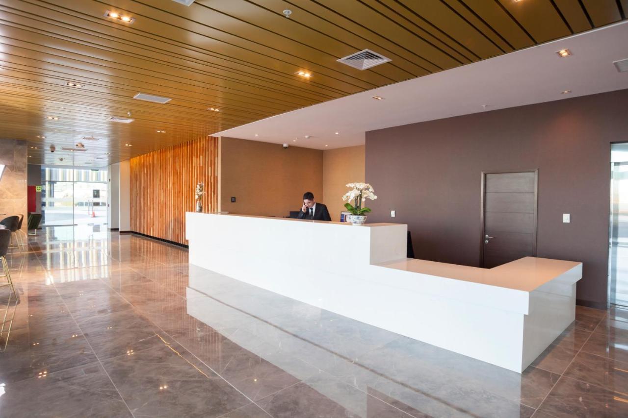 Mds Hotel Chillan Exterior photo Reception desk at the airport